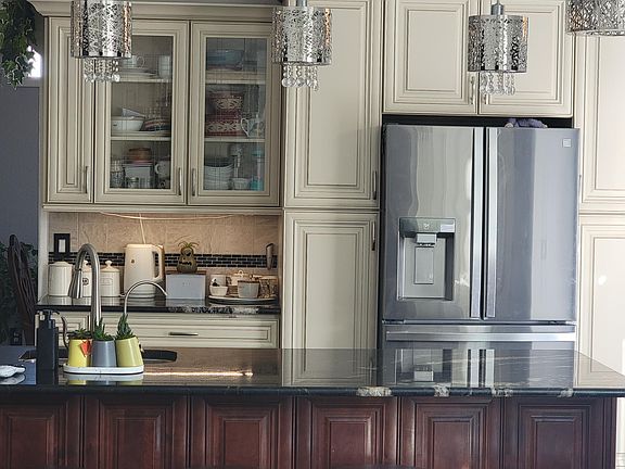 Kitchen with granite Cabinet Tops