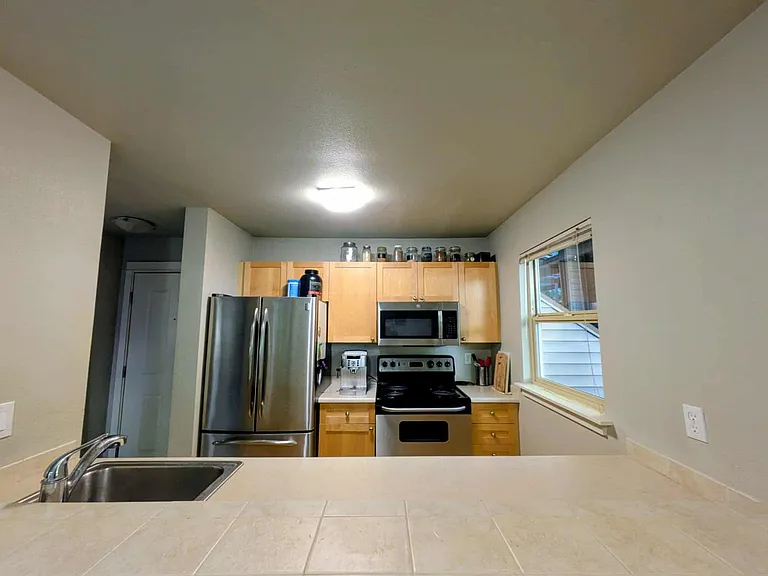 9805 Avondale Rd NE #V157 — Photo 22