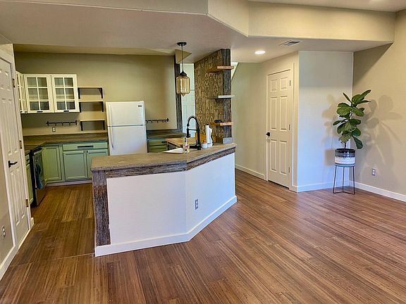 Open concept dining room/living room/kitchen