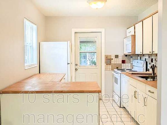 5th image of 3340 74th Ave N APT A
