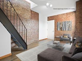 416 E 13th St