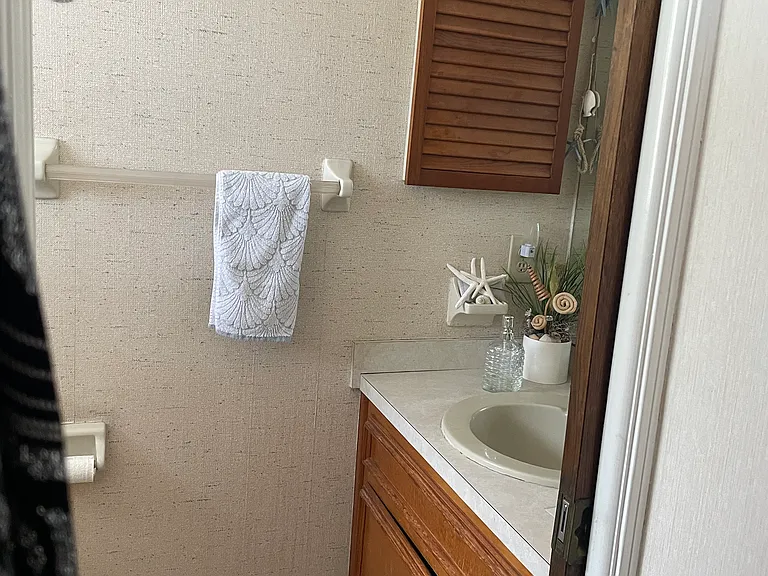Half bathroom next to laundry room