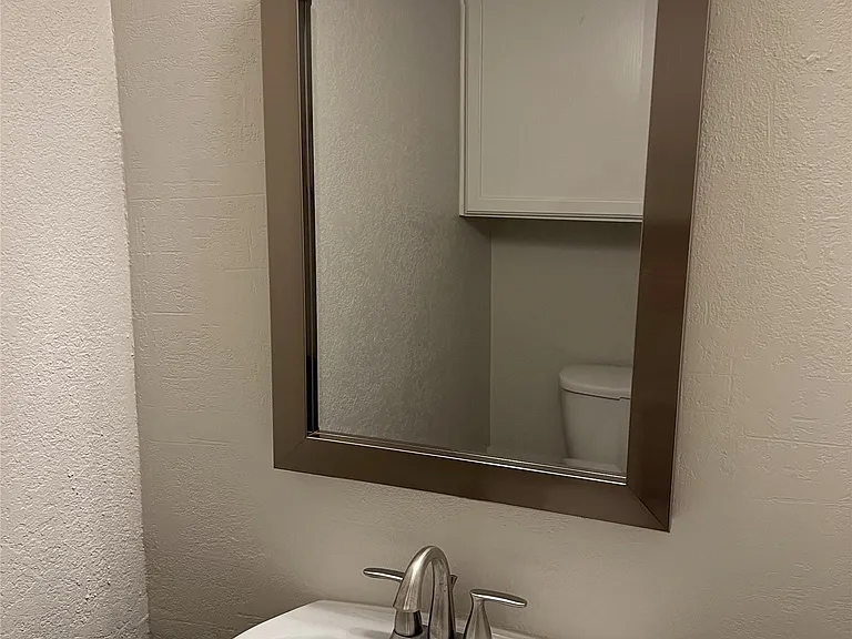 Powder bath is just off the entry.
