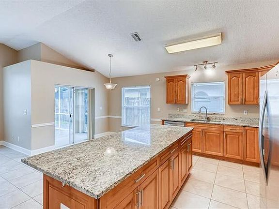 4th image of 10220 Oasis Palm Dr