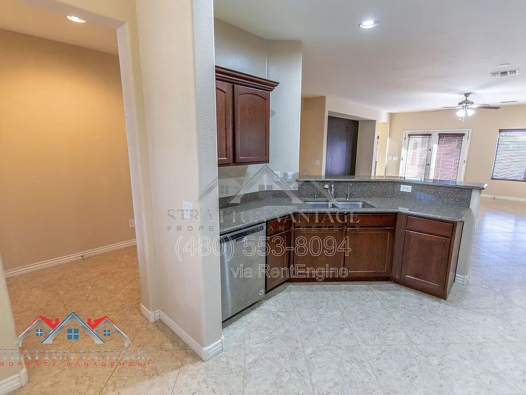 11751 W Daley Ln — Photo 14