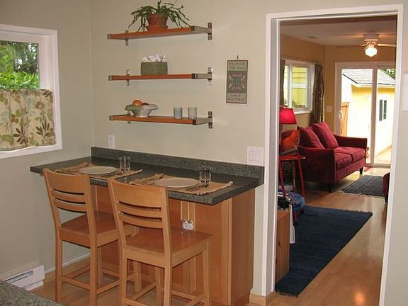 View from entry of dining/prep counter and living area