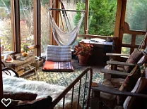 Porch facing lake, cozy and peaceful.
Swing and daybed.