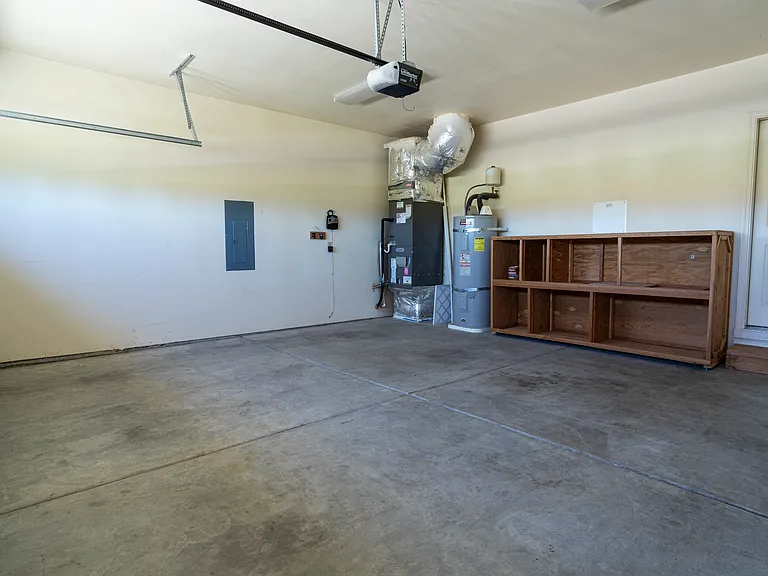 Two-car garage (water heater, central air, and watering system control)
