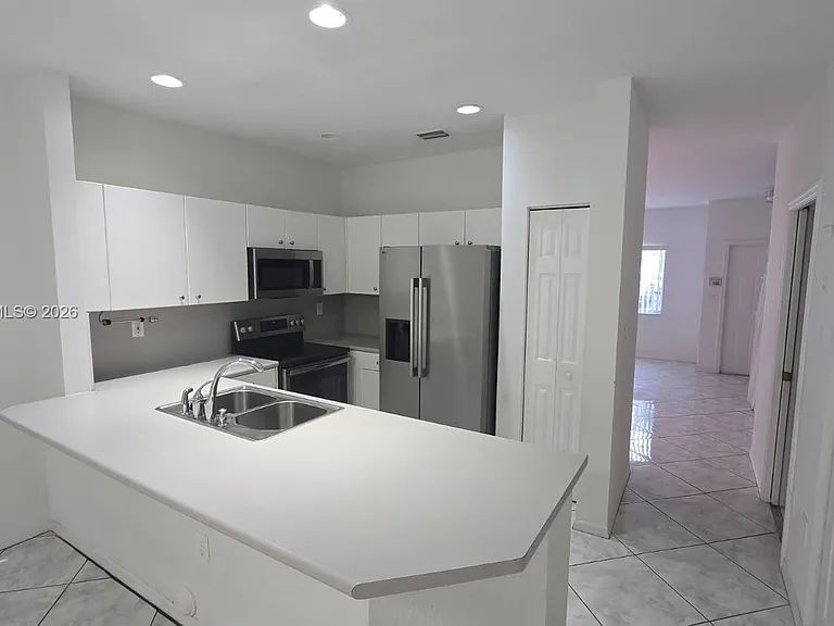 5791 NW 116th Ave #101 — Photo 5