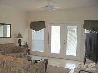 Open living area with tile floor