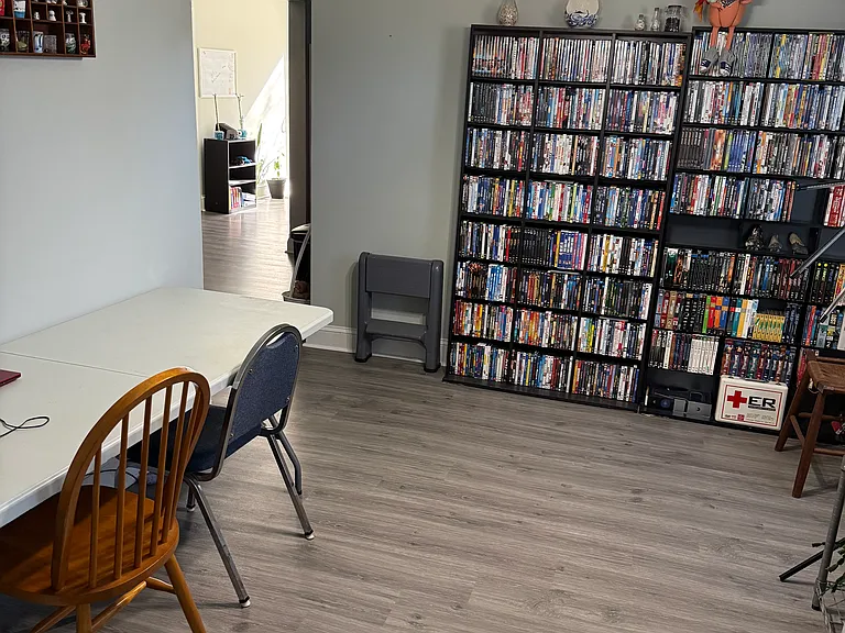 Dining room is being used like an office.