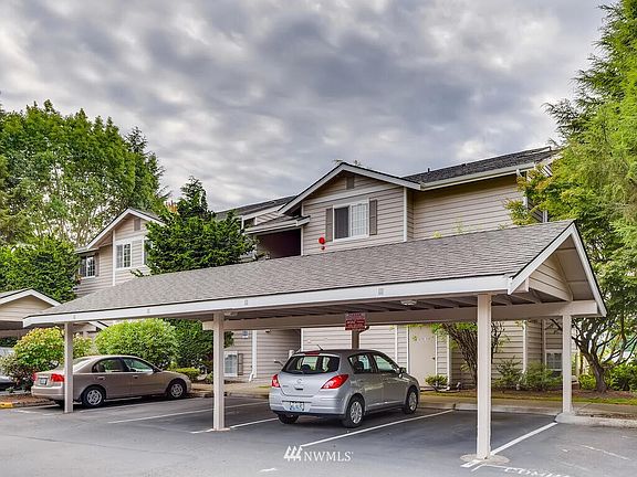 Two covered parking spots included