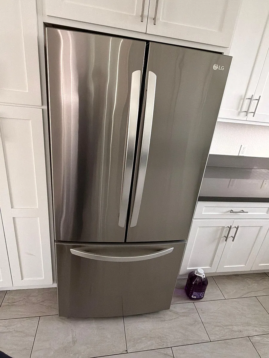 New LG refrigerator in kitchen - 442 W 126th St