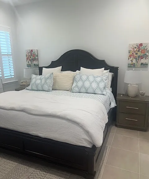 Master bedroom leads to a two sink bathroom with a large glass shower and enormous walk in closet! All California closets.