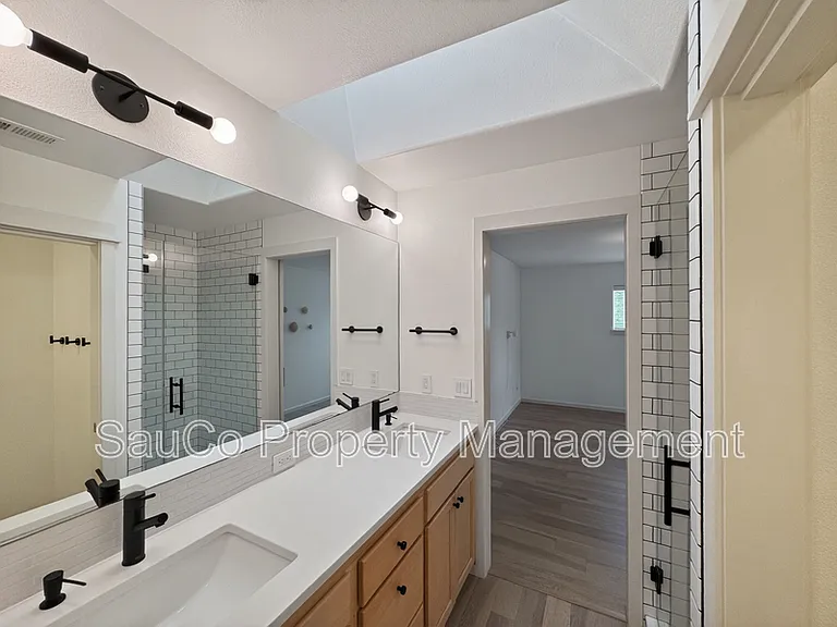 7399 NE Stonewater St — Photo 22
