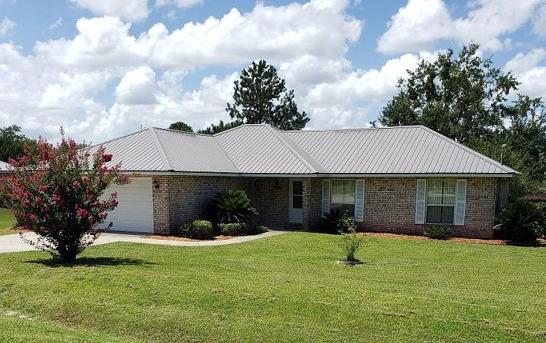 1st image of 306 SW Woodcrest Dr