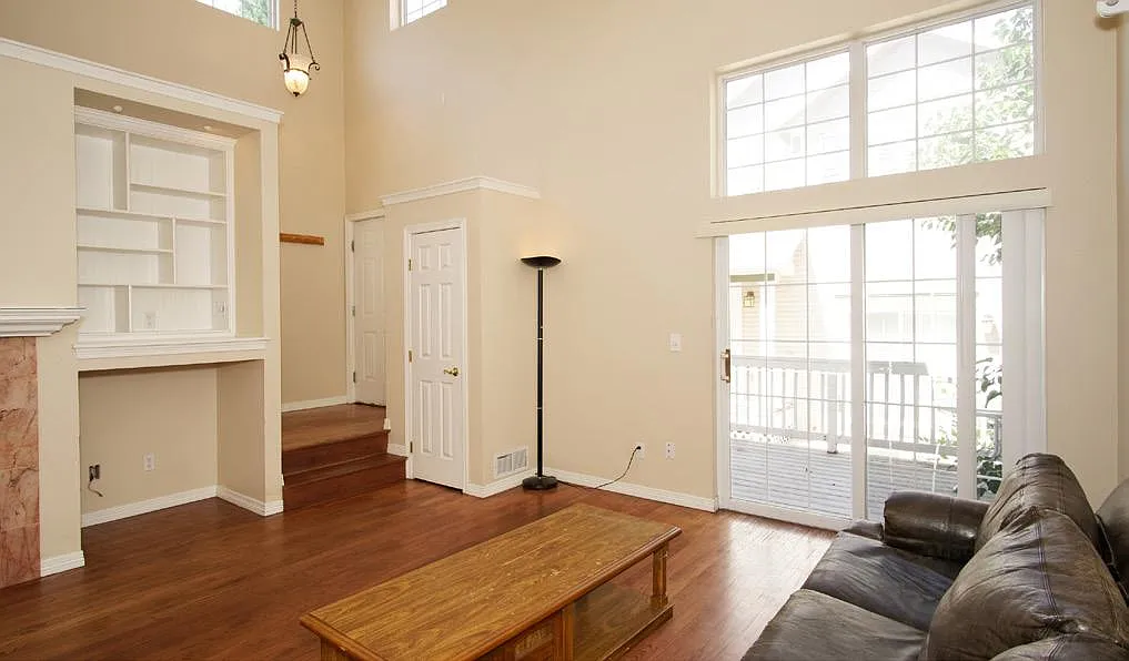 living room with vaulted ceiling , gas fireplace - 2080 S Josephine St #3