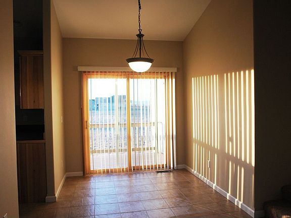 Formal dining/tile flooring/sliding glass door out to back deck