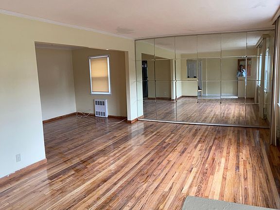 Hard wood floored living rooom