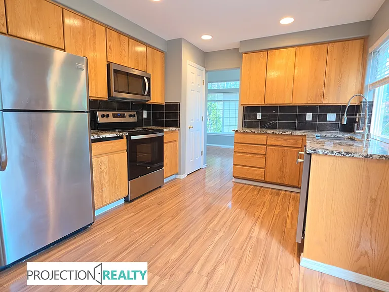 15239 NW Moresby Ct — Photo 8