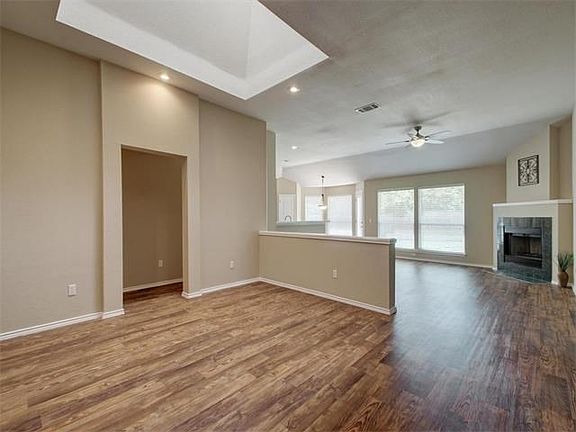 Stunning open floorplan with loads of natural light from skylight