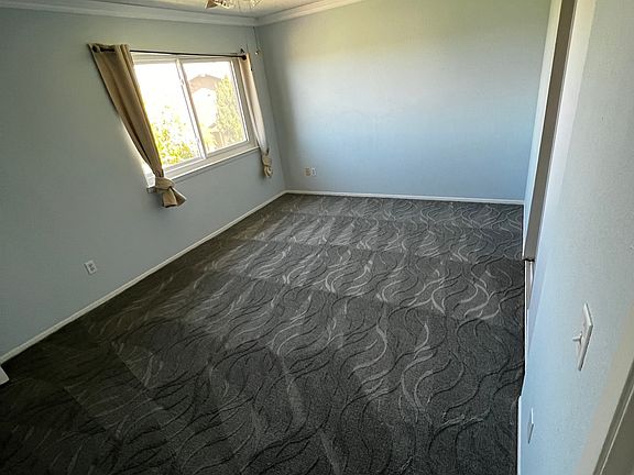 Primary bedroom located on the 2nd floor. Overlooks the shared courtyard.