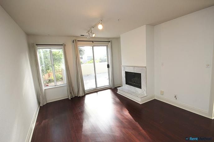 Living Room with Beautiful Hardwoods and Fireplace