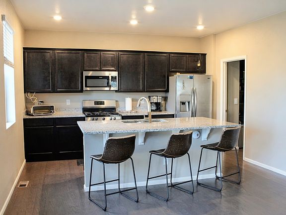 Eat in kitchen with island bar