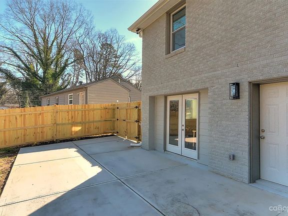 Patio area, apartment entrance, Fenced gate entrance