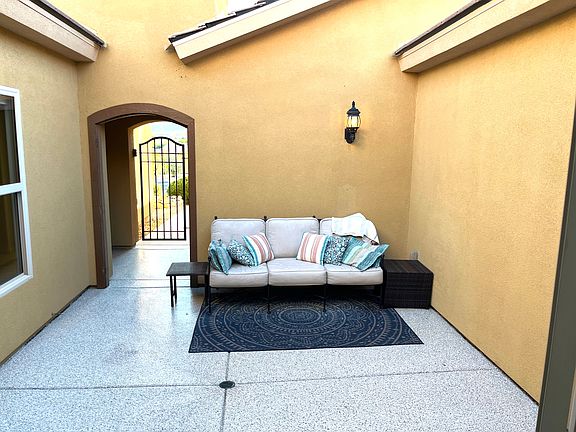 Private gated front courtyard