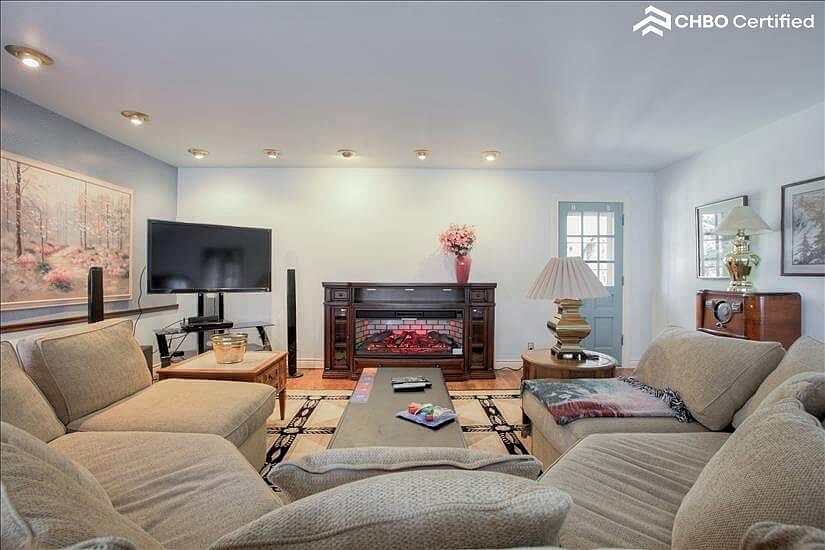 T.v. room- Has a fireplace.
