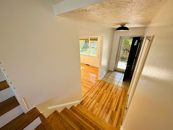 View of den and entrance