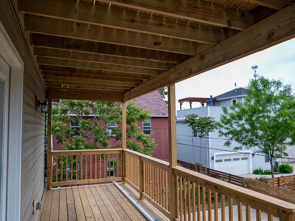 Private second story deck with stairs from parking area. There is a deck off the third story but there are no tenants on the third floor. It is essentially an unused space so there are no neighbors above.