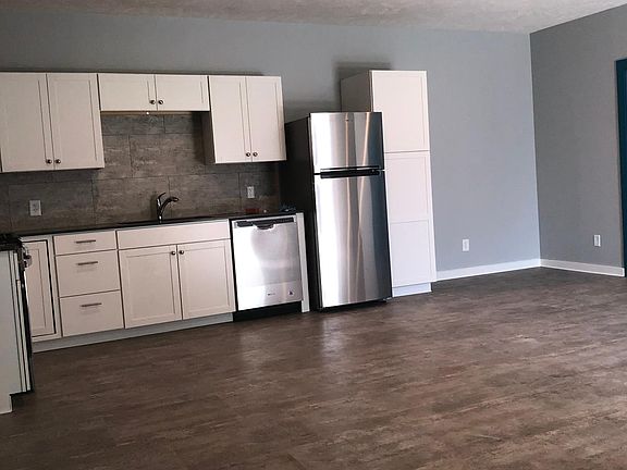 large open dining and family room of kitchen