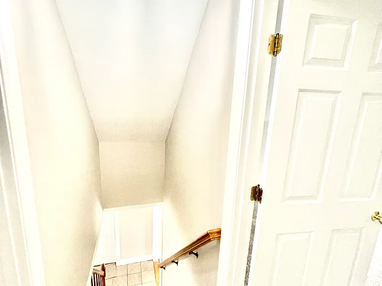 Stairs looking down from the top.