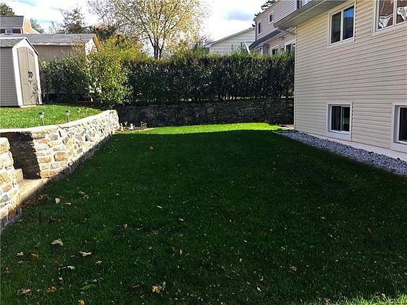 Double layered backyard - perfect for kids, parties, and sun-worshipping!