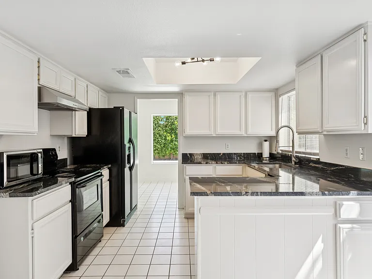 7736 E Buena Terra Way — Photo 6