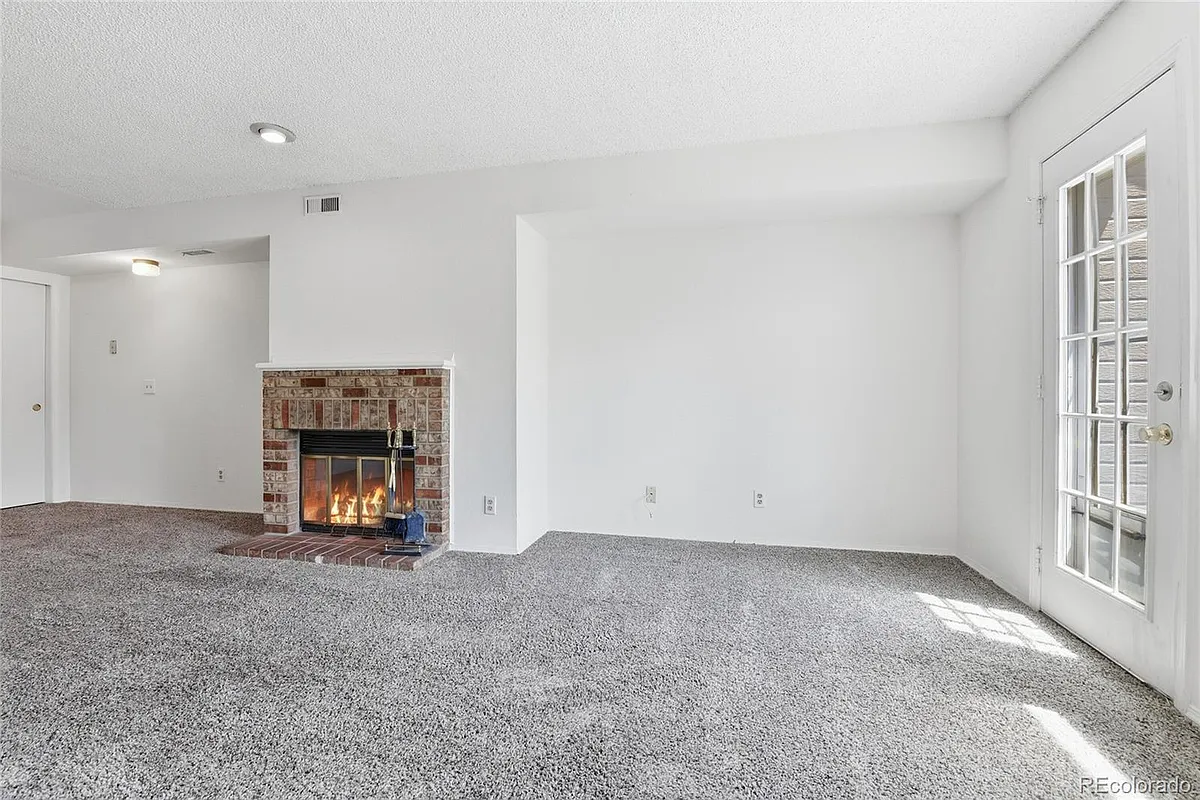 Building Photo - 5041 Garrison St #202G