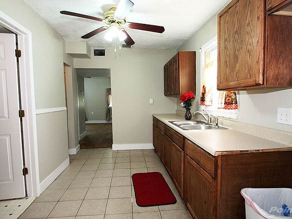 Newer ceramic tile & ceiling fan light fixture!