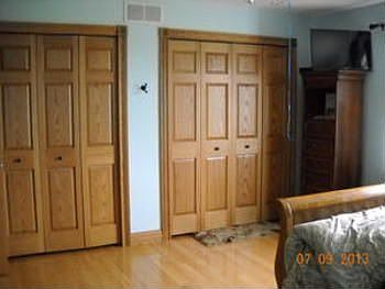 A view of part of the master bedroom, we offer plenty of closet space, plus your very own masterbath. There is also another bedroom across the hallway.