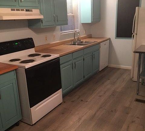 Eat-in Kitchen with pantry and newly updated cabinets and fl