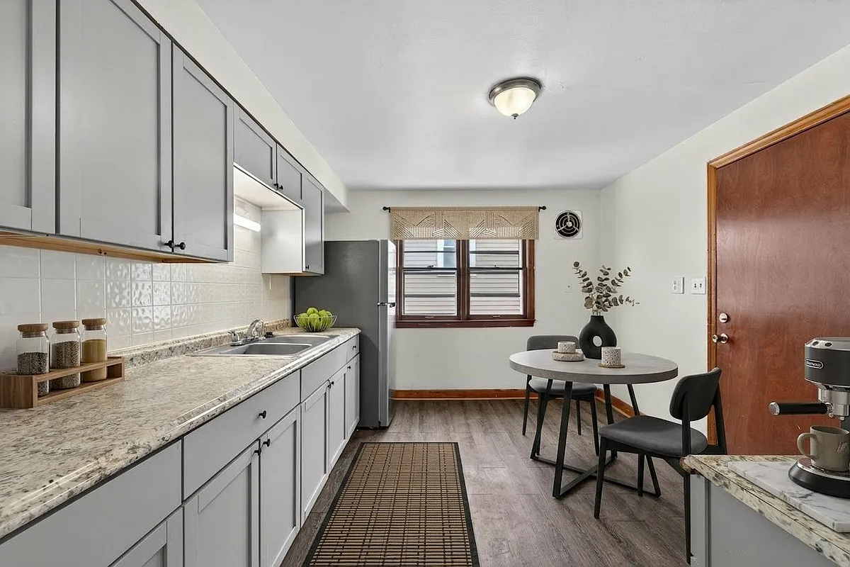 Building Photo - 3628-30 N 58th Blvd #UPPER