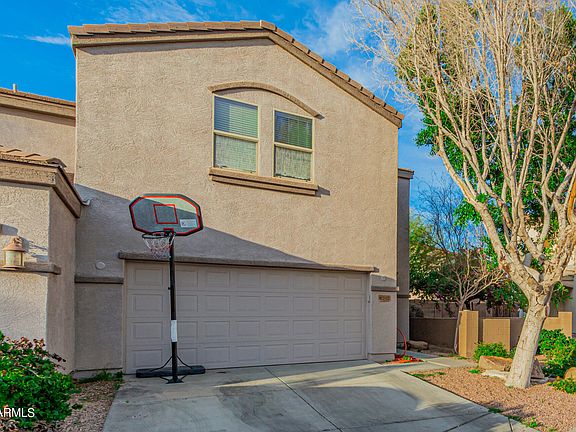 4th image of 8732 W SURREY Avenue