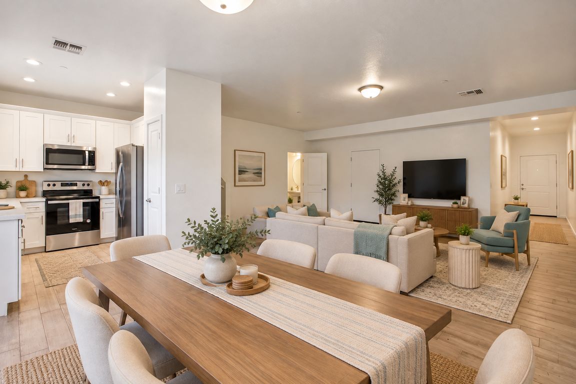 Living, kitchen and dining area staged