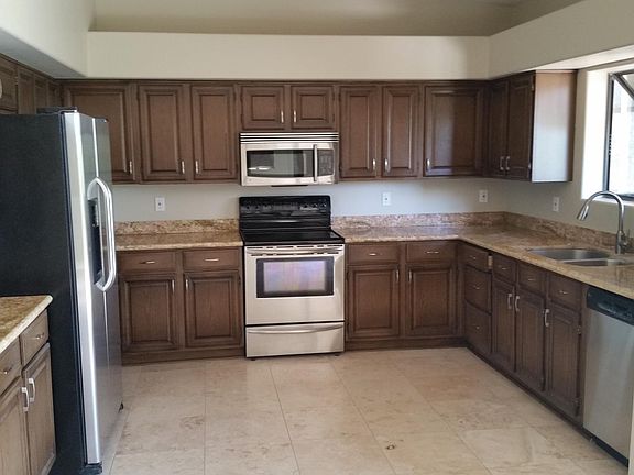 Kitchen with Stainless Appliances, Granite counters and Garden Window