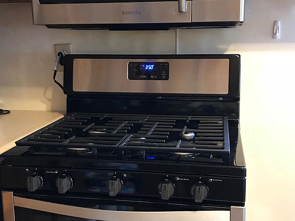 updated stainless-steel gas stove and microwave
