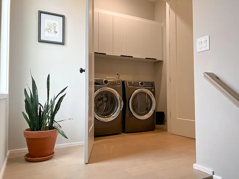 Laundry is located at the top of the third floor