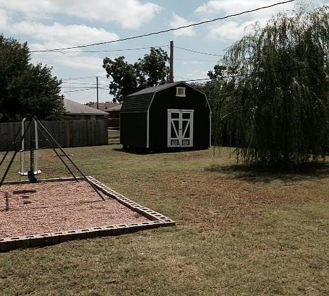 Swing set (and rock area) is gone, new picture coming soon.