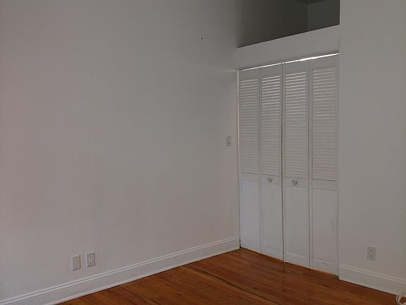 Original hardwood floors in bedroom