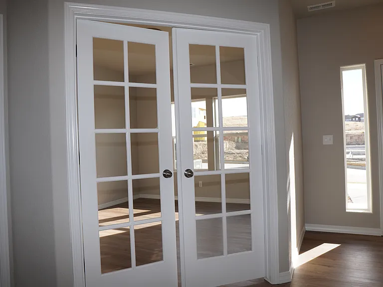 Dedicated office space with french door.